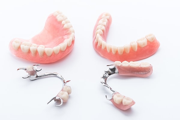 Dentures can look natural and hide missing teeth.