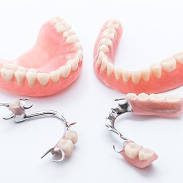 A full and partial set of dentures